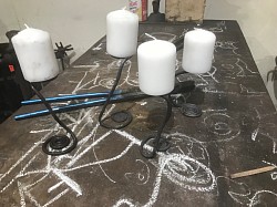 A collection of Candle Holders made by Students
